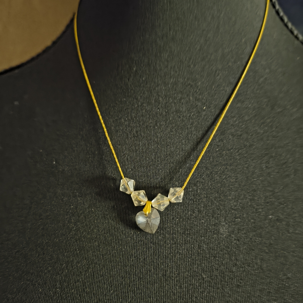 Elegant Gold Cord Necklace with Clear Crystal Heart Pendant